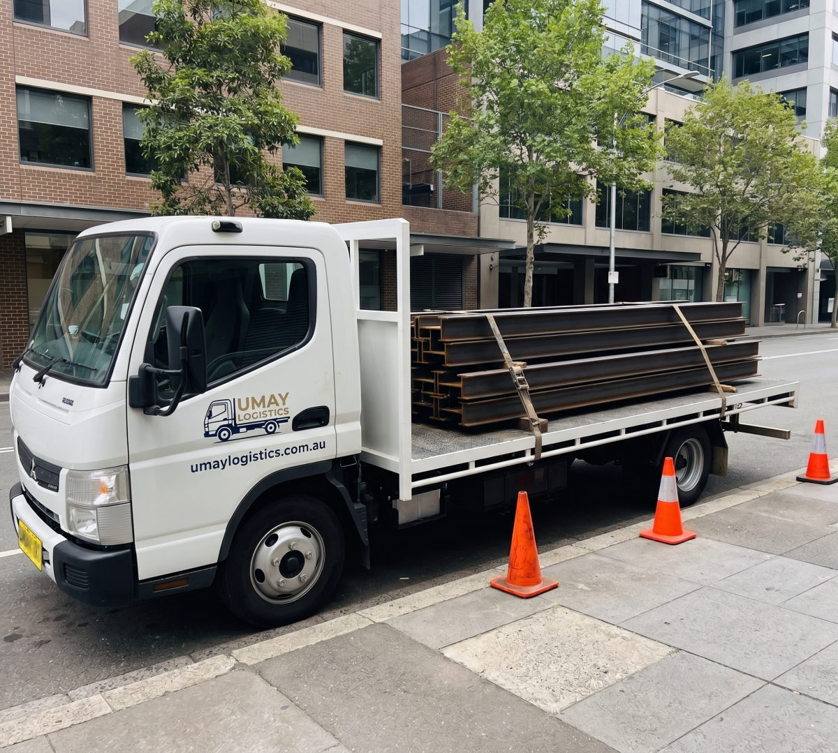 Umay Logistics truck loaded with steel beams in Sydney